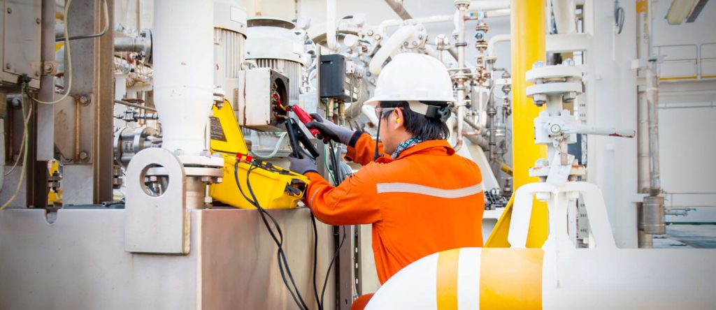 Technician fixing electric equipment